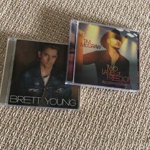 2. country CDs Tim McGraw and Brett Young